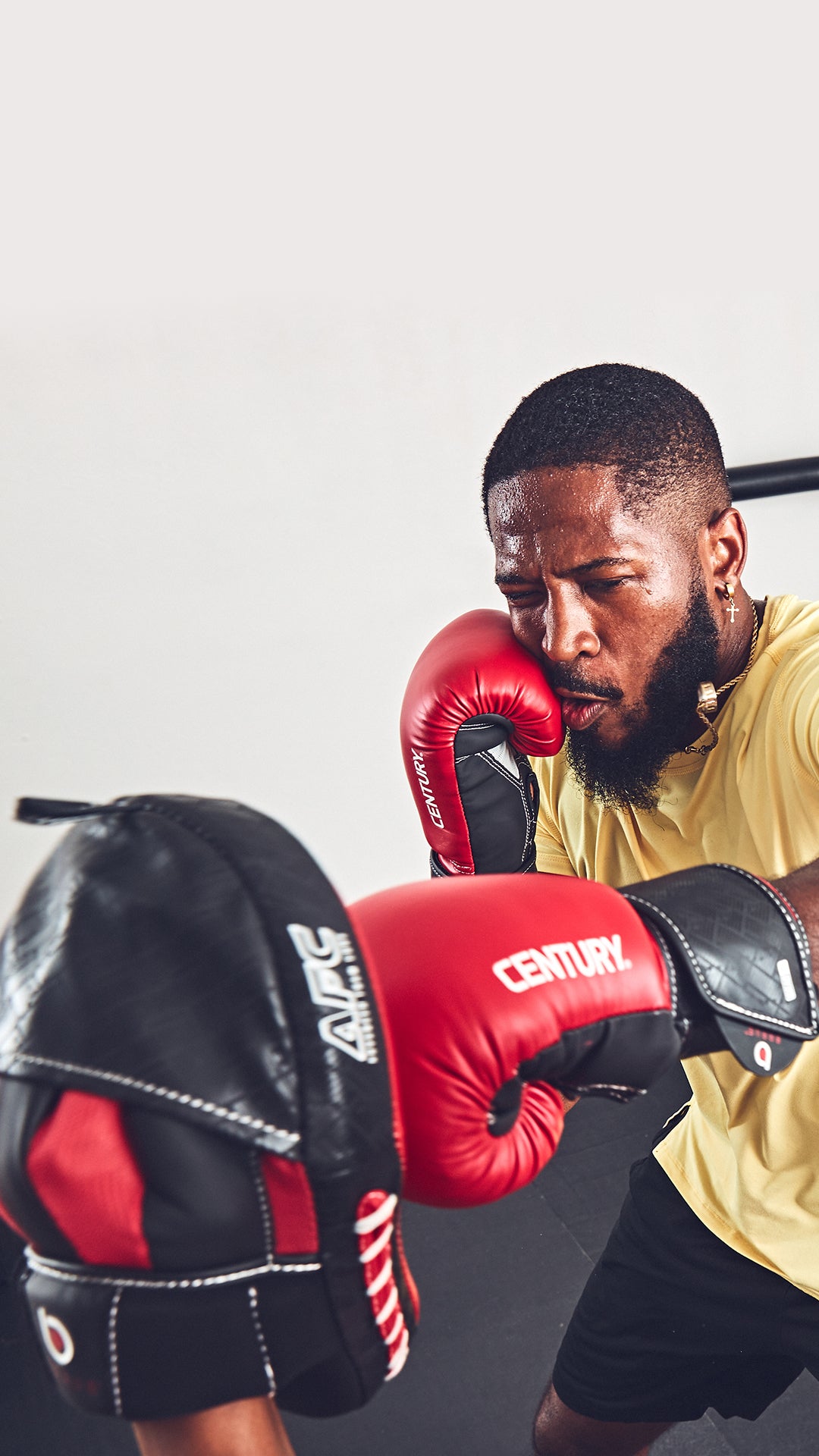 man wearing brave boxing gloves